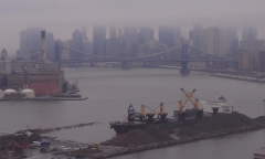 Low clouds concealed the Manhattan skyline on a rainy Monday in Brooklyn.