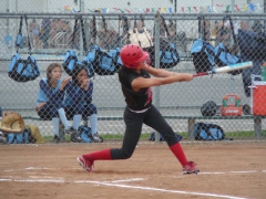 My daughter Kimberly Cruz connecting for a solo home run.